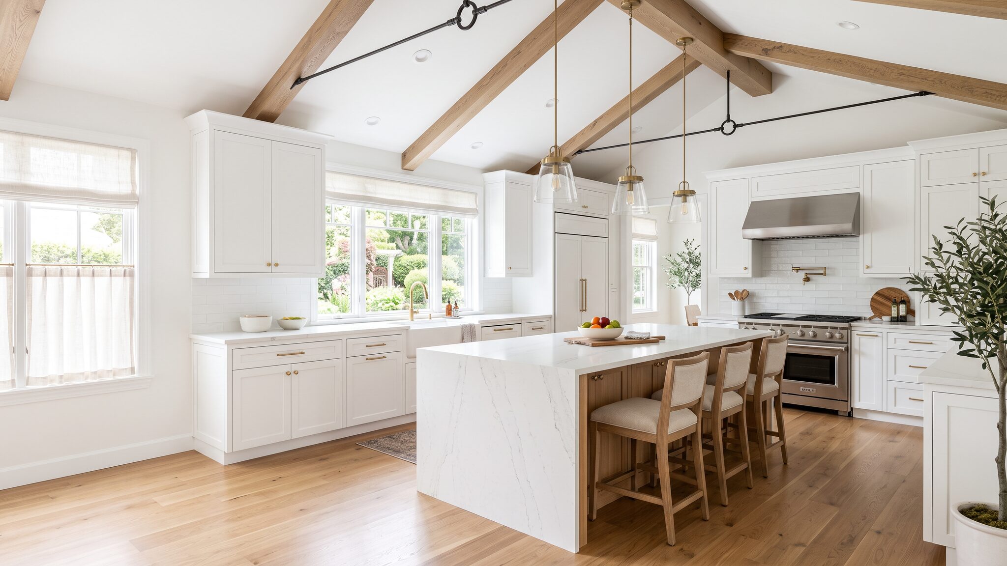 Bright, contemporary kitchen with white shaker cabinetry, a light-wood island, and refined finish details